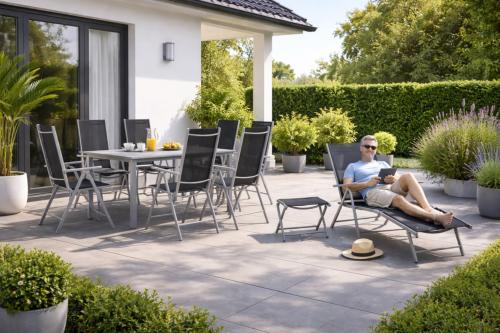 Salon de jardin aluminium gris, avec table, 6 fauteuils, chaise longue et repose-pieds