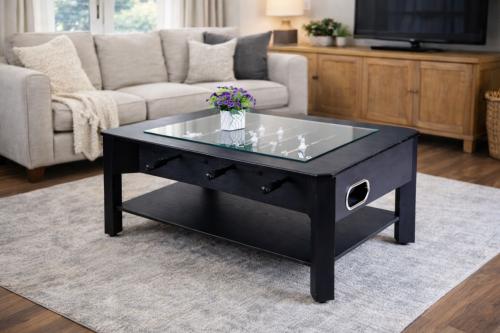 Table basse bois noir, 112 cm avec babyfoot incorporé